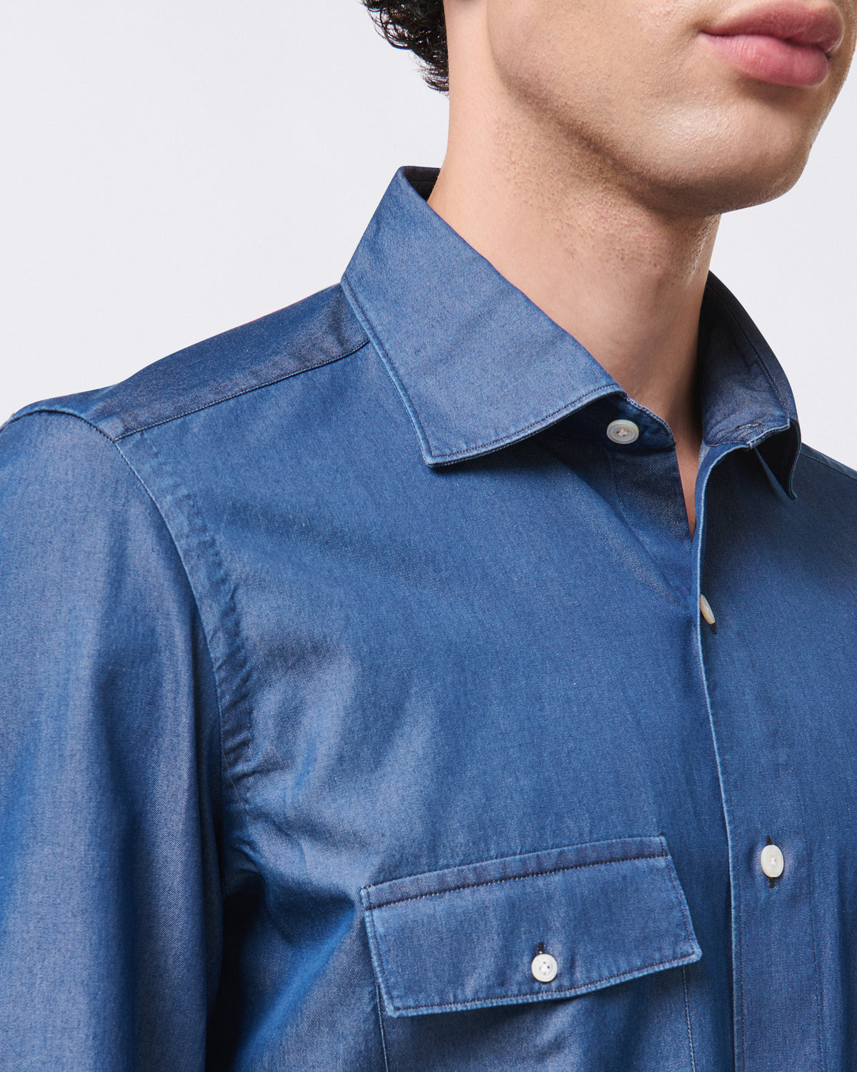 Tokyo slim denim shirt with two flap pockets. Stone wash