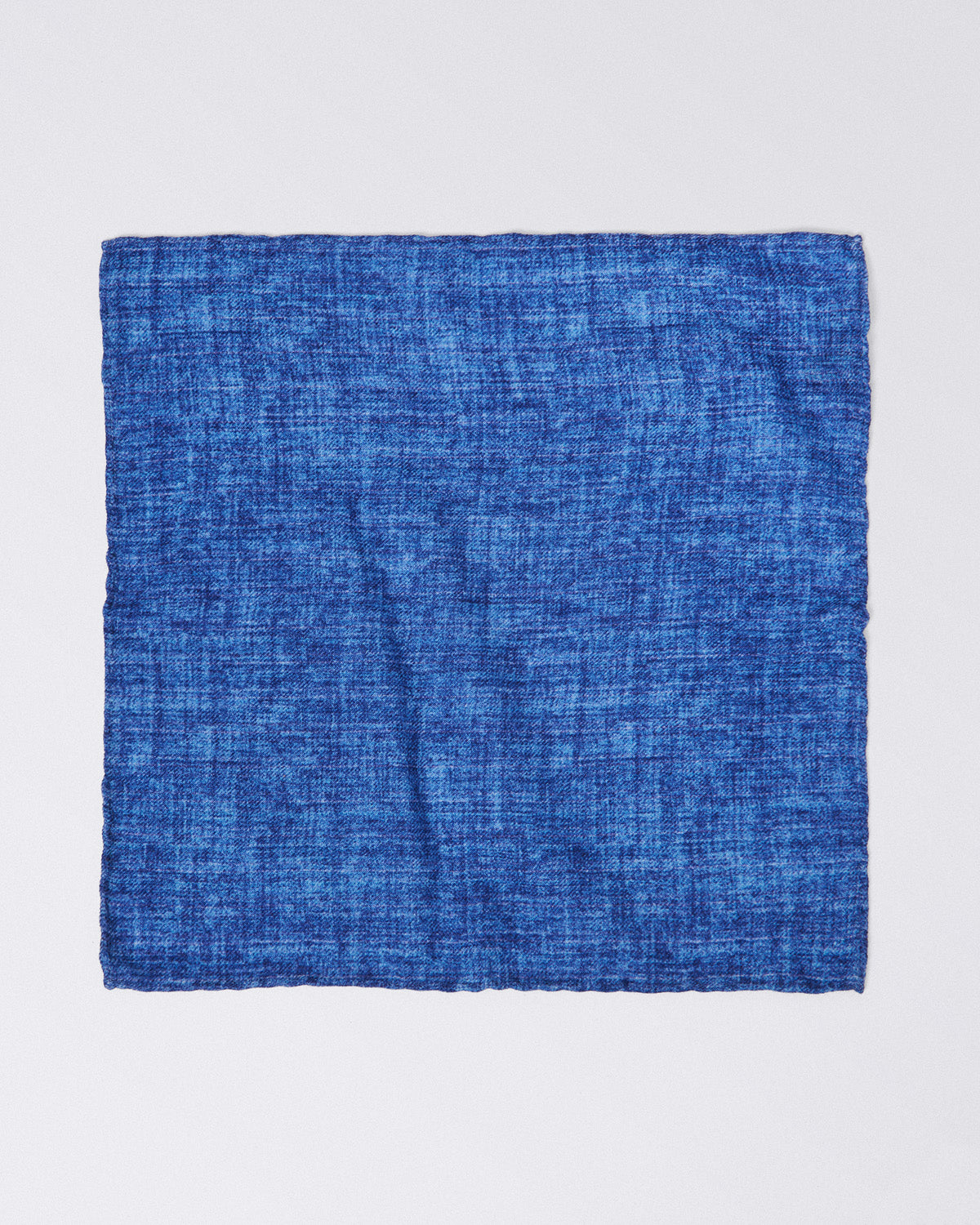 Hand finished single colour wool pocket square. Blue Finamore