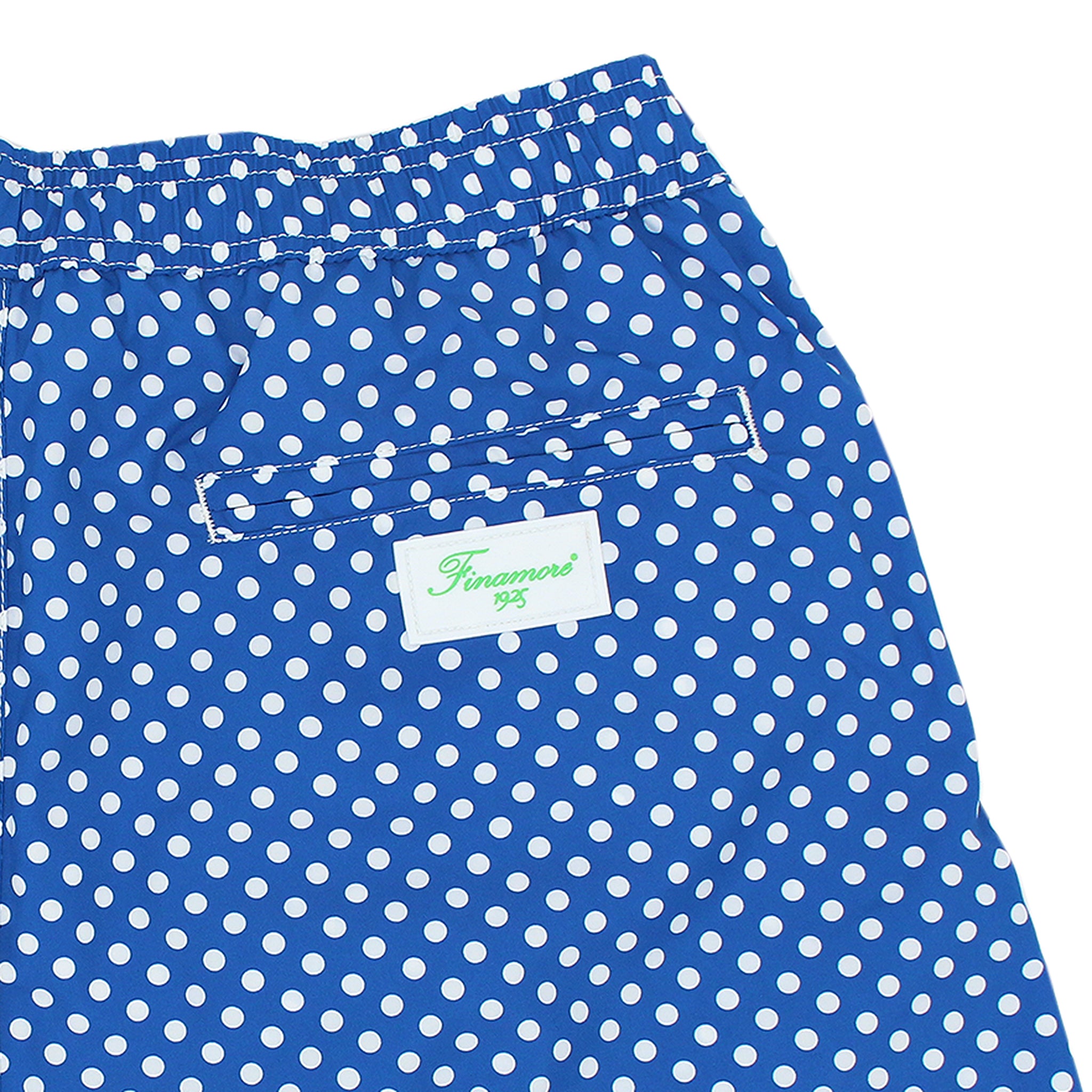 Costume da bagno a pois blu e bianchi. Asciugatura rapida e multitasche