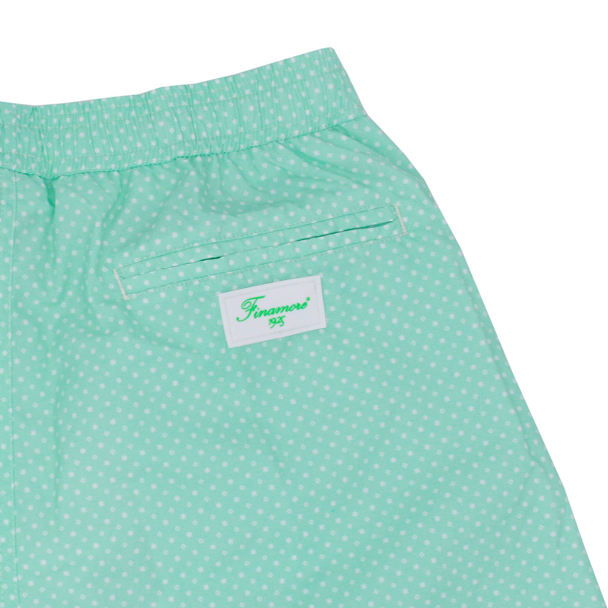 Costume da bagno verde chiaro con pois. Asciugatura rapida e multitasche