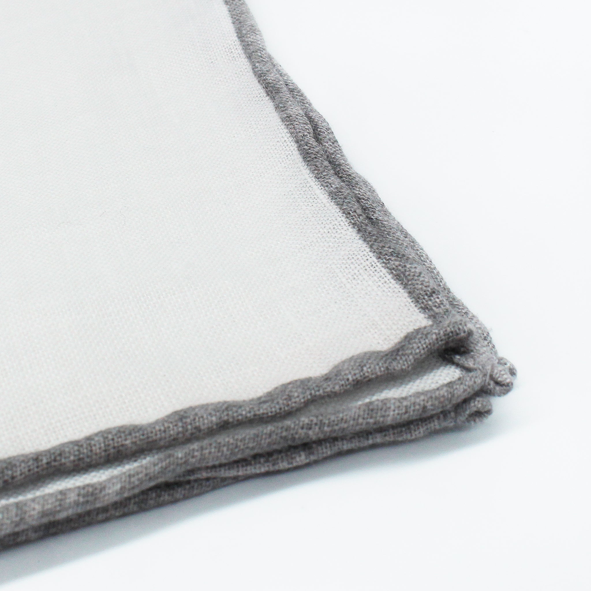 Linen pocket square with white background and gray border