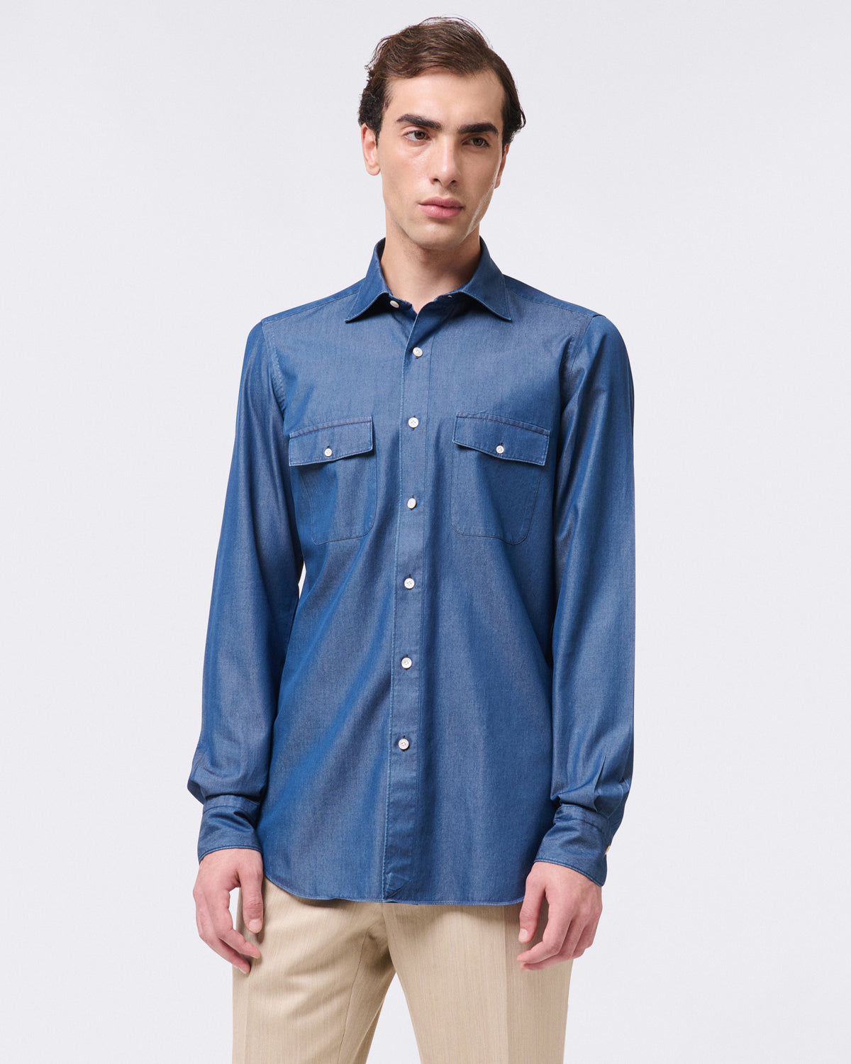 Tokyo slim denim shirt with two flap pockets. Stone wash
