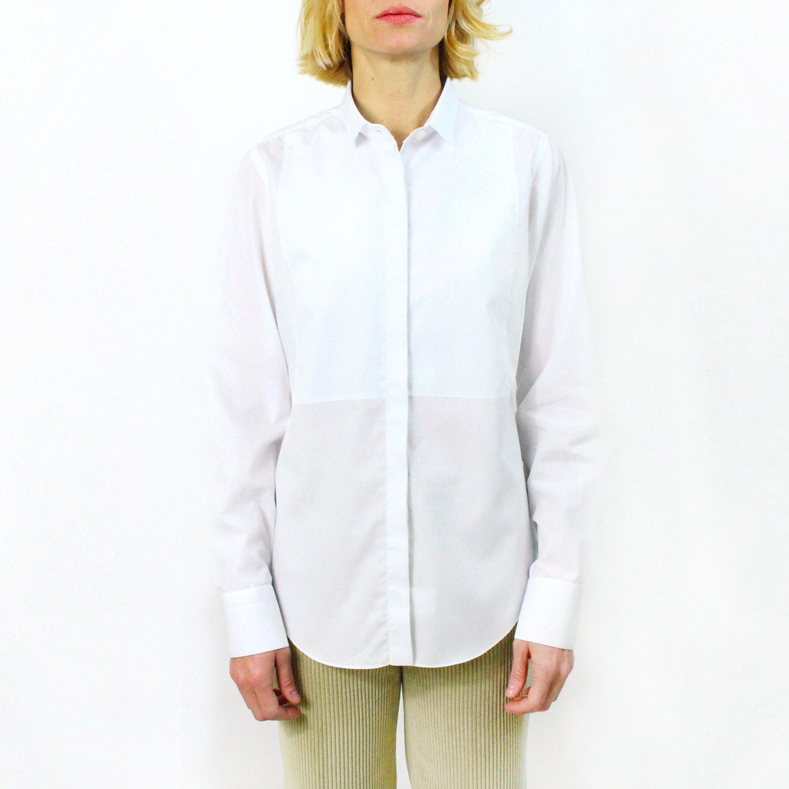 Women's white cotton shirt with bib and covered cannon