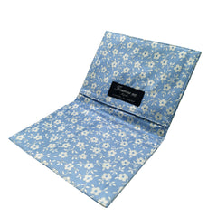 Document holder light blue background and white flowers