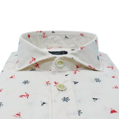 Garment dyed white polo shirt with anchors and rudder print