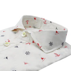 Garment dyed white polo shirt with anchors and rudder print