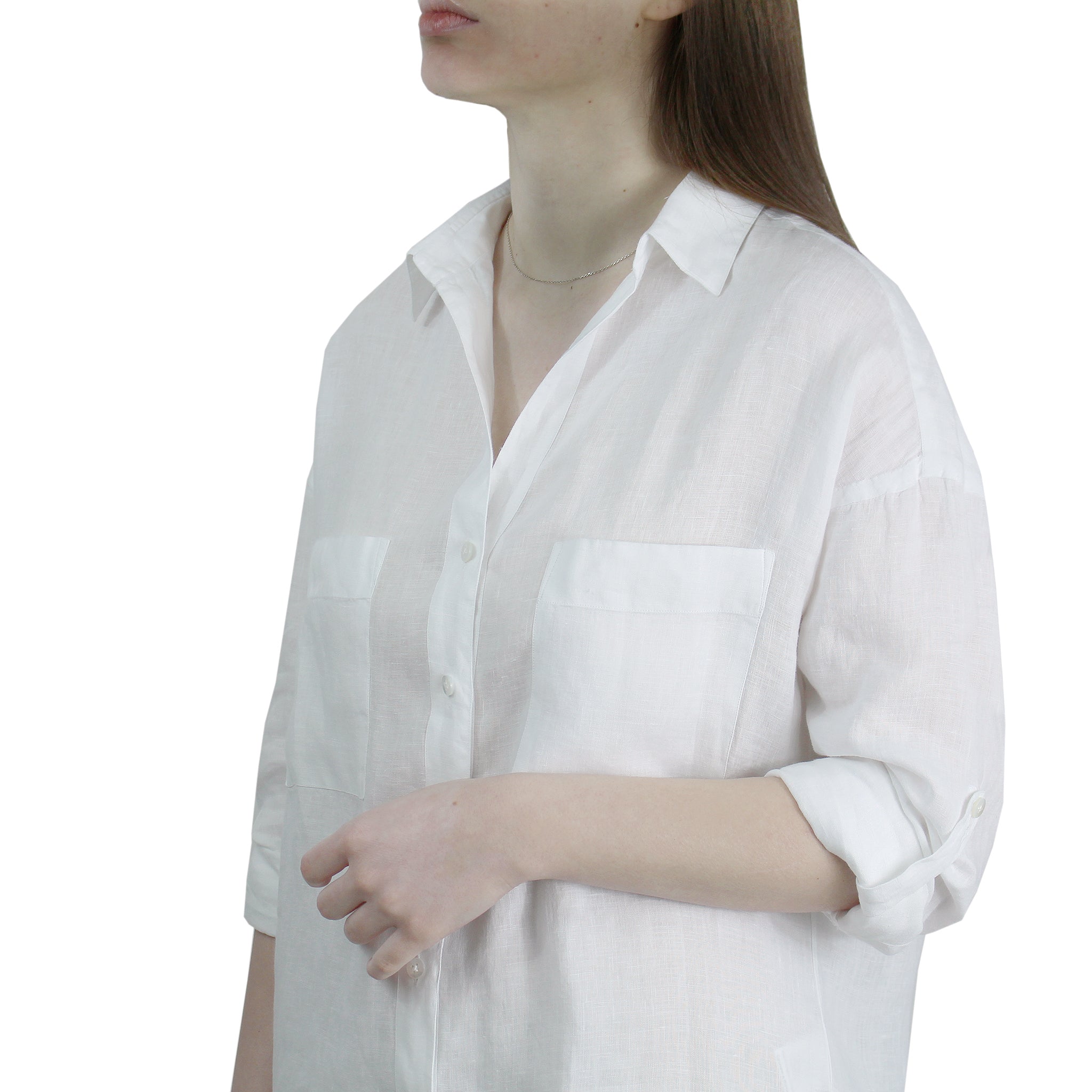 Camicia bianca in lino con tasche e fettuccia per regolare la manica
