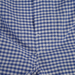 Boxer blu sfondo grigio a scacchi